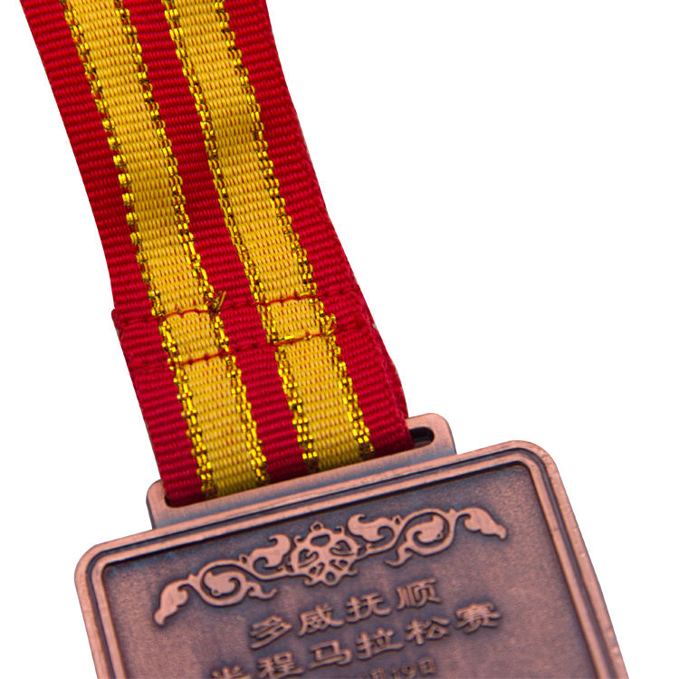 Medal sewn to fit wide loop